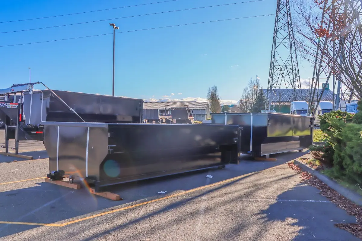 Roll-off dumpster ready for waste disposal at job site for Construction Dumpster Rental in Tewksbury